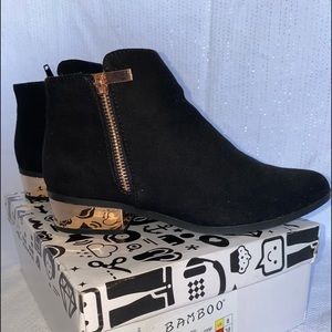 Black booties with gold details Box included